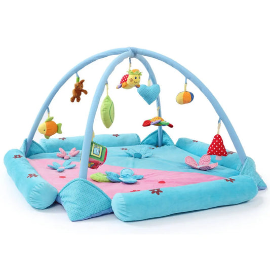Tapis bébé floral avec 9 suspensions colorées et tissu ultra-doux pour éveil sensoriel.