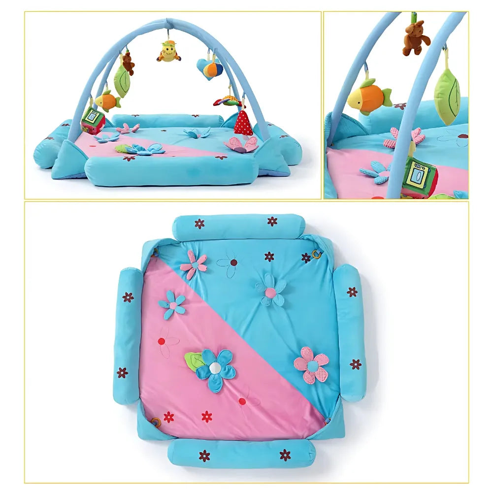 Tapis bébé floral avec 9 jouets suspendus, tissu doux et rebords moelleux pour un cocon sensoriel.