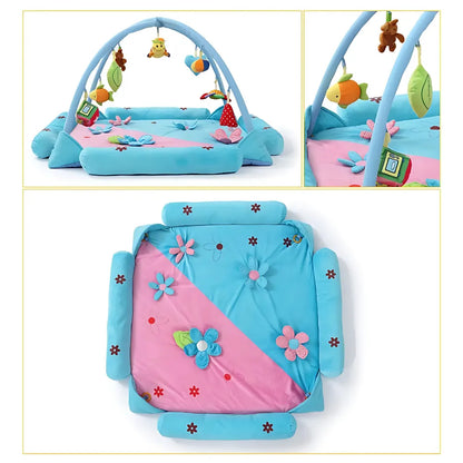 Tapis bébé floral avec 9 jouets suspendus, tissu doux et rebords moelleux pour un cocon sensoriel.