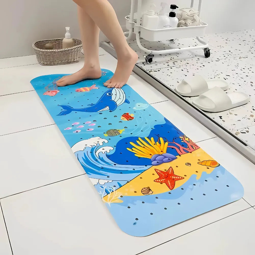 Tapis de bain bébé antidérapant avec motif baleine et starfish, idéal pour sécurité et éveil ludique.