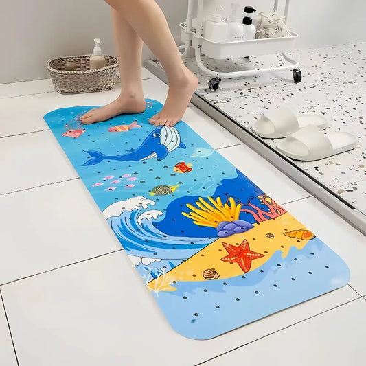 Tapis de bain bébé antidérapant avec motif baleine et starfish, idéal pour sécurité et éveil ludique.